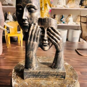 human face decorative showpiece statue.